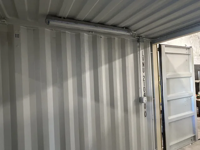 Custom generator enclosure built from a modified shipping container