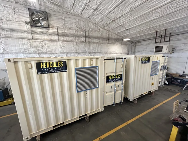 Interior of a generator housing with mounting brackets and cable routing