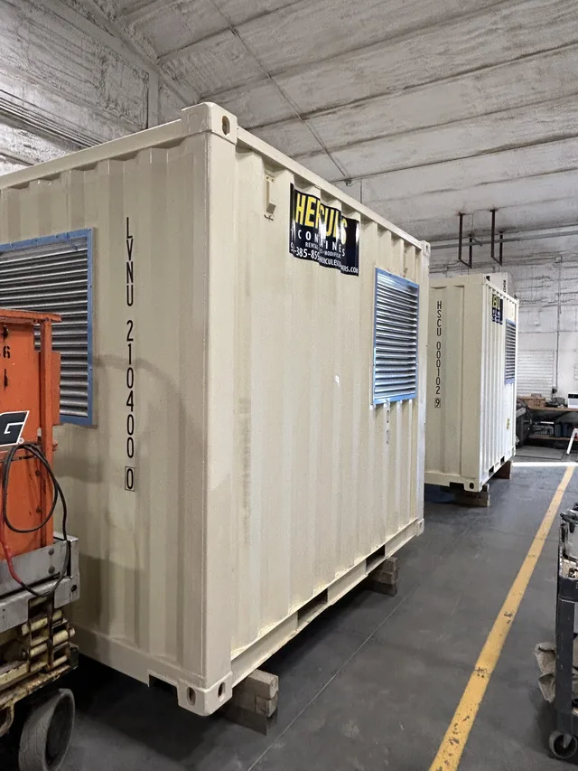 Ventilation louvers and exhaust routing on a generator container