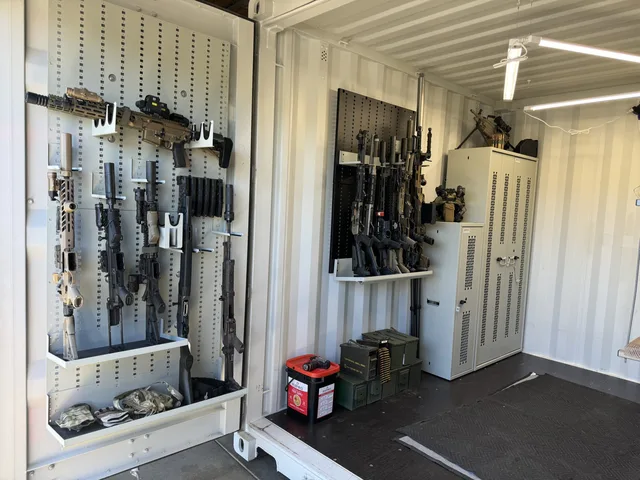 Custom roll-up door installation on a Gunfighter container modification