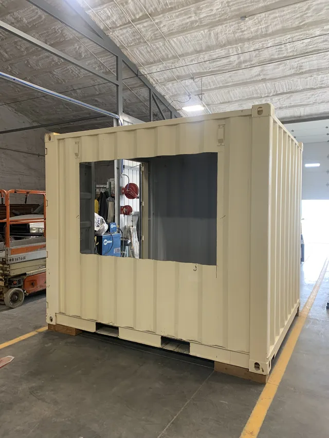 Custom container with added awning and exterior lighting package