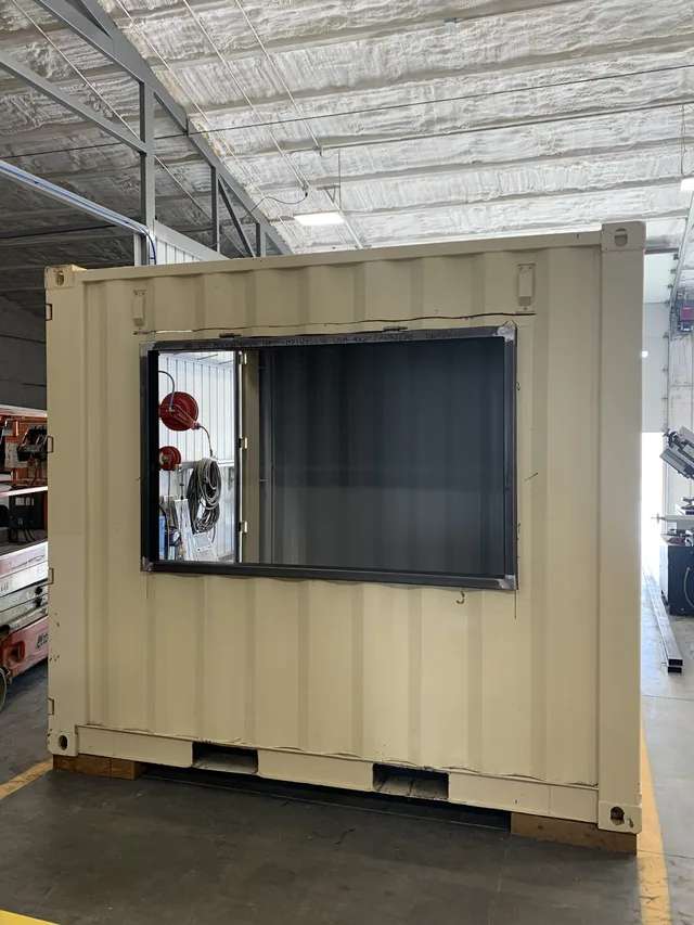 Container modification with integrated gutter and downspout system