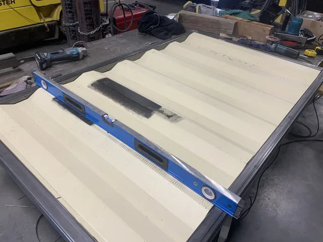 Exterior view of a fully modified container with custom paint finish