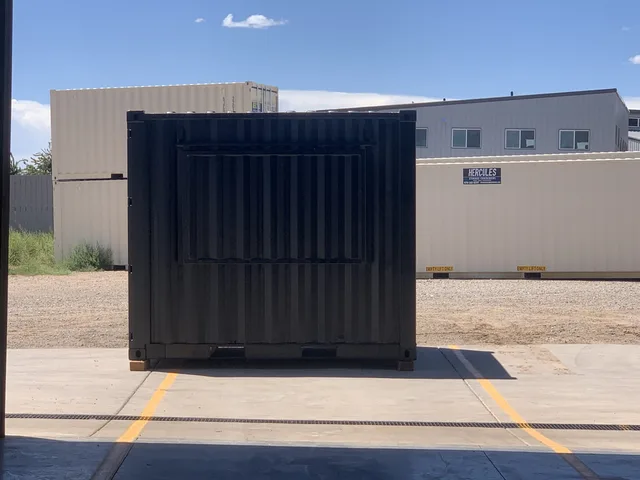 Container with custom-width personnel door and ADA-compliant threshold