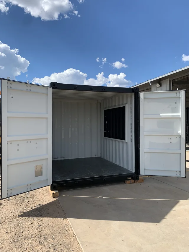 Exterior staircase and landing platform on a stacked container setup