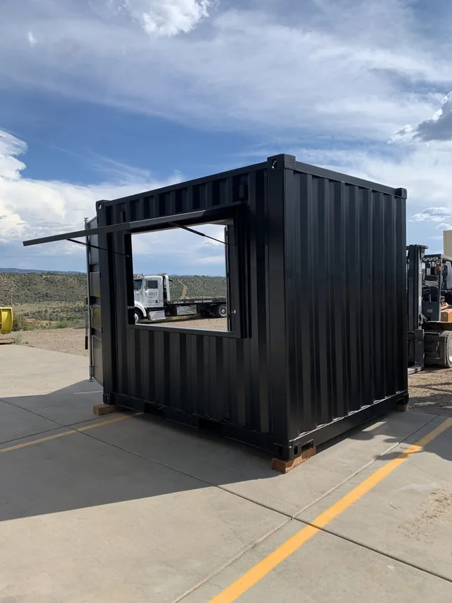 Custom awning and canopy over a container entrance by Hercules