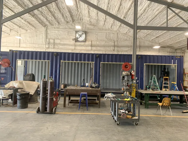 Container modification showing waterproof membrane and flashing