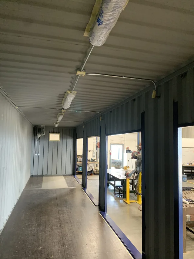 Container with custom exterior color matching customer specifications