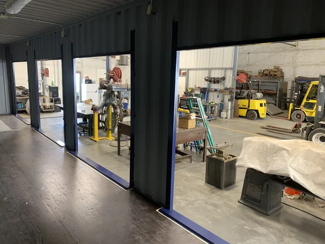 Interior lighting and ceiling installation in a container build-out