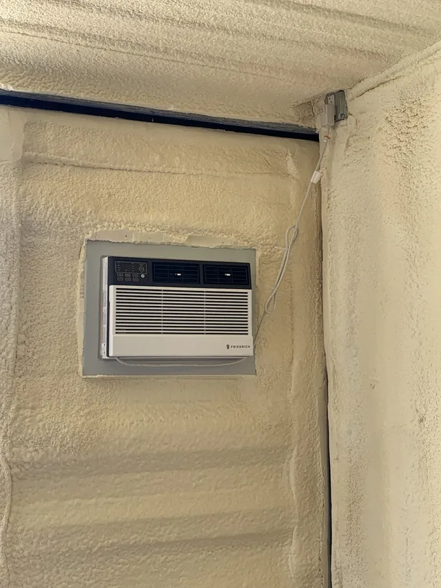 Interior framing and insulation for a container office conversion