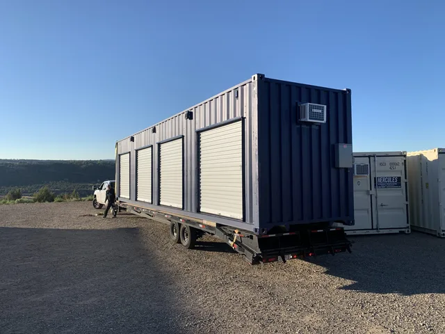 Modified container exterior showing custom color and logo placement