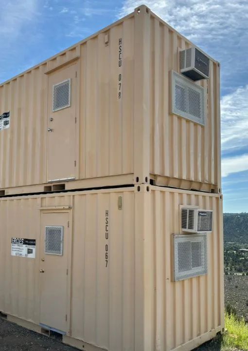 Side view of a container showing ventilation modifications