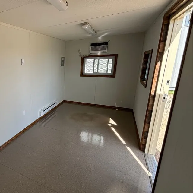 Container with fresh exterior paint in a customer-specified color