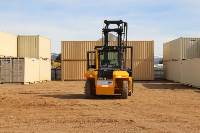 Container interior lit by natural light from open cargo doors