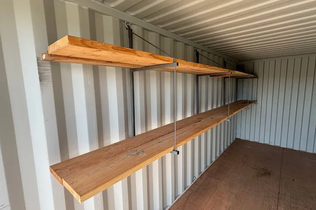Container interior showing adjustable shelving for inventory management