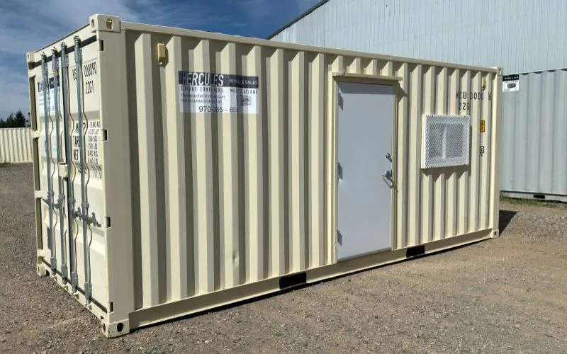 Container being relocated by delivery truck